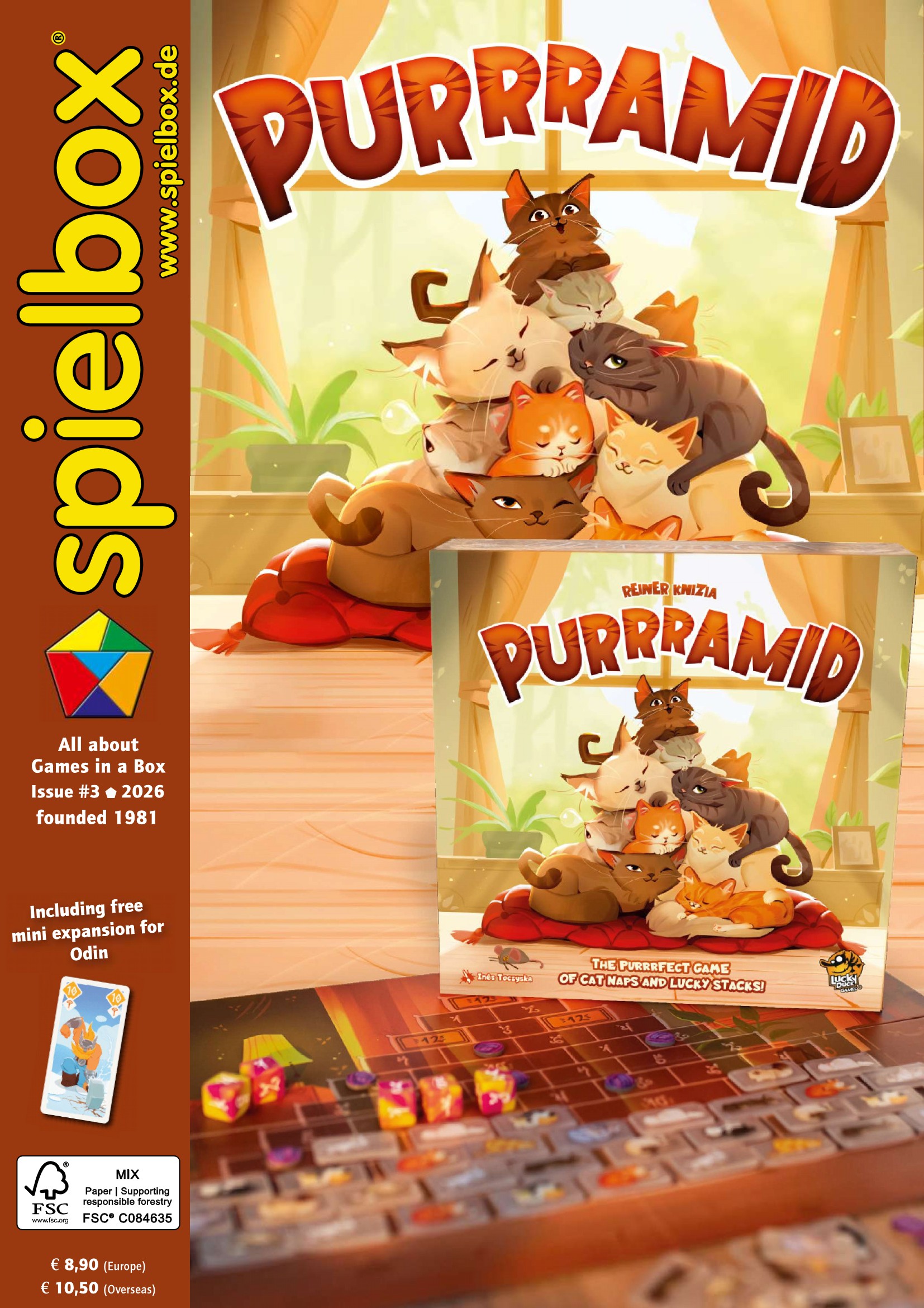 Cover of spielbox 3/2026 with the game PURRAMID from Lucky Duck